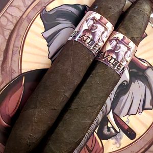 Two Dividend cigars on a table