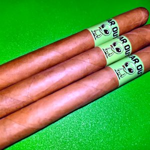 3 Far Out cigars laying on a table