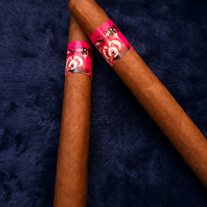 2 Censored cigars on table